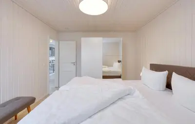 Ein Bett oder Betten in einem Zimmer der Unterkunft Haus Liam
