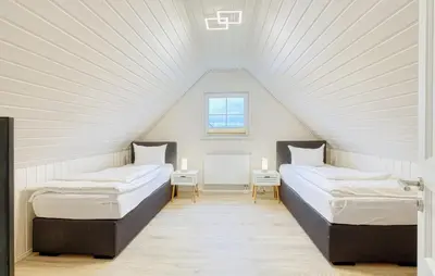 Ein Bett oder Betten in einem Zimmer der Unterkunft Haus Liam