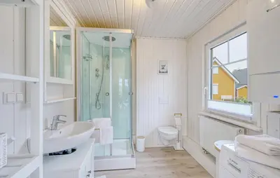 Ein Badezimmer in der Unterkunft Haus Rike