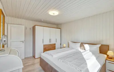 Ein Bett oder Betten in einem Zimmer der Unterkunft Haus Wald & Wiese