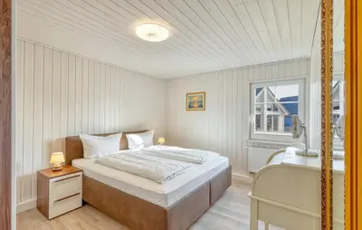 Ein Bett oder Betten in einem Zimmer der Unterkunft Haus Wald & Wiese