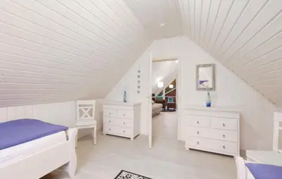 Ein Bett oder Betten in einem Zimmer der Unterkunft Haus zum maritimen Blick