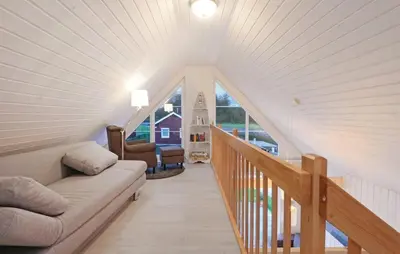 Ein Sitzbereich in der Unterkunft Haus zum maritimen Blick