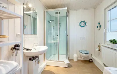 Ein Badezimmer in der Unterkunft Hus Karibu