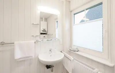 Ein Badezimmer in der Unterkunft Hus Rehkitz