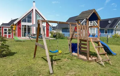 Ein Kinderspielbereich in der Unterkunft Ferienhaus Kuntabü
