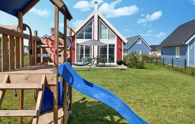 Ein Kinderspielbereich in der Unterkunft Ferienhaus Kuntabü