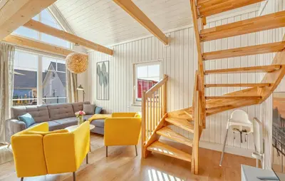 Ein Sitzbereich in der Unterkunft Ferienhaus Kuntabü