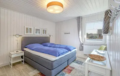 Ein Bett oder Betten in einem Zimmer der Unterkunft Lavendel-Lodge