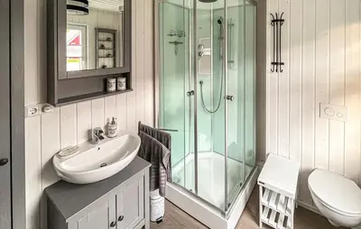 Ein Badezimmer in der Unterkunft Lille Hus