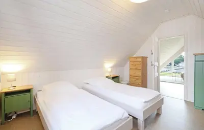 Ein Bett oder Betten in einem Zimmer der Unterkunft Lykkebo