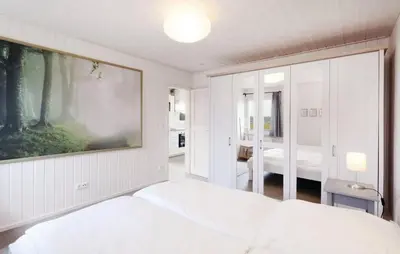 Ein Bett oder Betten in einem Zimmer der Unterkunft Lykkebo