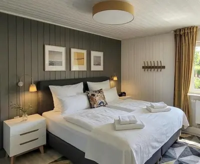 Ein Bett oder Betten in einem Zimmer der Unterkunft Nordhus