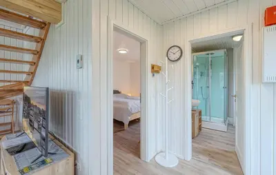 Ein Bett oder Betten in einem Zimmer der Unterkunft Onkel Toms Hütte