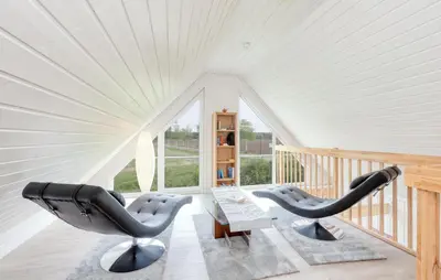 Ein Sitzbereich in der Unterkunft Onkel Toms Hütte