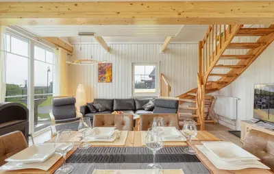 Ein Sitzbereich in der Unterkunft Onkel Toms Hütte