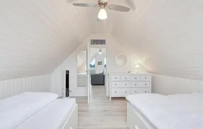 Ein Bett oder Betten in einem Zimmer der Unterkunft Villa Kunterbunt