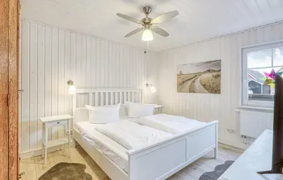Ein Bett oder Betten in einem Zimmer der Unterkunft Villa Kunterbunt