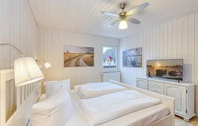 Ein Bett oder Betten in einem Zimmer der Unterkunft Villa Kunterbunt