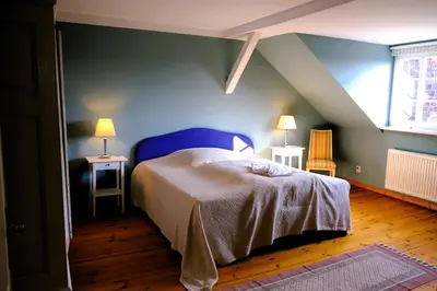 Ein Bett oder Betten in einem Zimmer der Unterkunft Hofensemble nahe Berlin