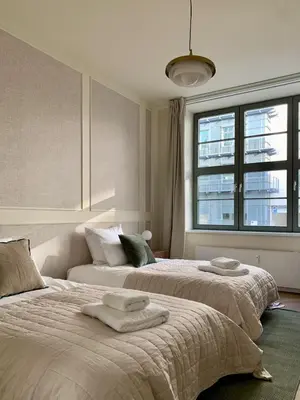 Ein Bett oder Betten in einem Zimmer der Unterkunft The Pushkin