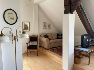 Ein Sitzbereich in der Unterkunft Gable house Ruppin Lake