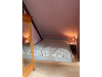 Ein Bett oder Betten in einem Zimmer der Unterkunft Gable house Ruppin Lake