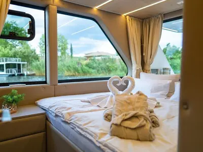 Ein Bett oder Betten in einem Zimmer der Unterkunft Harbor Suite Templin