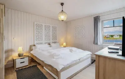 Ein Bett oder Betten in einem Zimmer der Unterkunft Haus Hafenblick