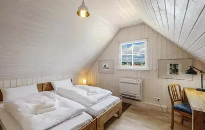 Ein Bett oder Betten in einem Zimmer der Unterkunft Haus Hafenblick