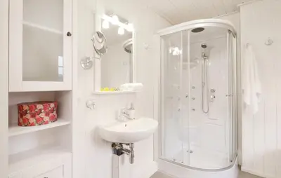 Ein Badezimmer in der Unterkunft Haus Hafenidyll
