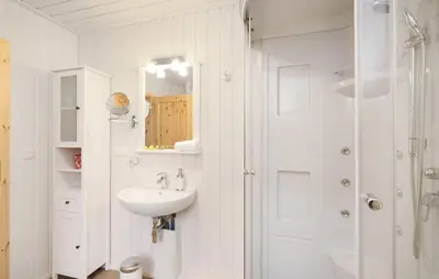 Ein Badezimmer in der Unterkunft Haus Hafenidyll