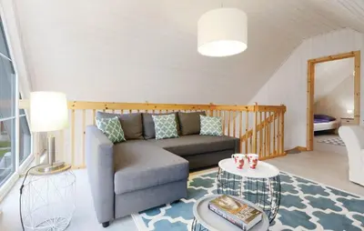Ein Bett oder Betten in einem Zimmer der Unterkunft Haus Hafenidyll