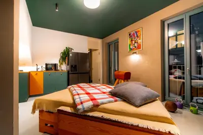 Ein Bett oder Betten in einem Zimmer der Unterkunft Heidels Design Loft & Gym Xberg