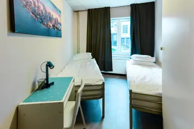 Ein Bett oder Betten in einem Zimmer der Unterkunft Etagenwohnung 110qm in der Villa Winckelmann