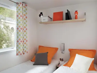 Ein Bett oder Betten in einem Zimmer der Unterkunft Apartment Mobilheim Lagune I in Lychen by Interhome