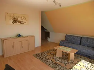 Ein Sitzbereich in der Unterkunft Apartment Appartement mit Blick auf das Wasser by Interhome