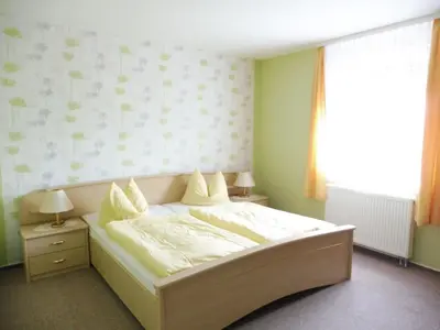 Ein Bett oder Betten in einem Zimmer der Unterkunft Apartment Appartement mit Blick auf das Wasser by Interhome