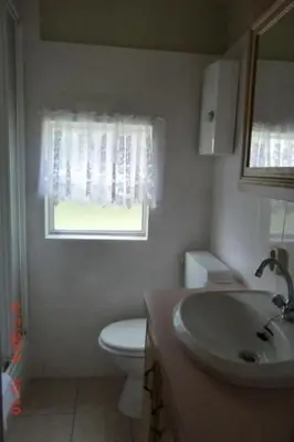 Ein Badezimmer in der Unterkunft Holiday Home mit Pool by Interhome