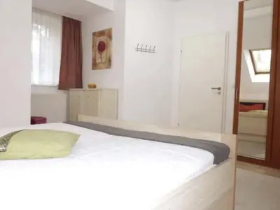 Ein Bett oder Betten in einem Zimmer der Unterkunft Apartment Wohung mit Balkon und Garten nahe Stadtgrenze by Interhome