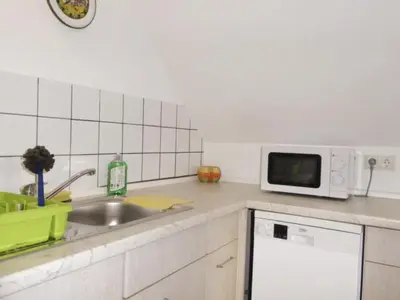 Küche/Küchenzeile in der Unterkunft Apartment Wohung mit Balkon und Garten nahe Stadtgrenze by Interhome