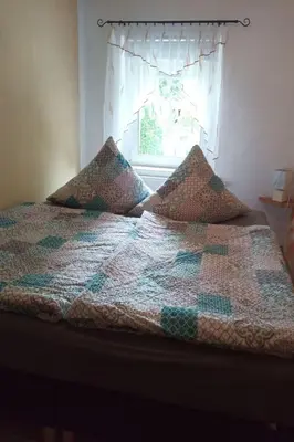 Ein Bett oder Betten in einem Zimmer der Unterkunft Apartment Gemütliche Wohnung mit Terrasse by Interhome