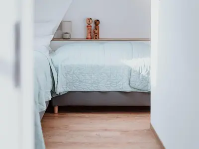 Ein Bett oder Betten in einem Zimmer der Unterkunft Holiday Home Spreewaldhaus am Landgut - Der Stall by Interhome