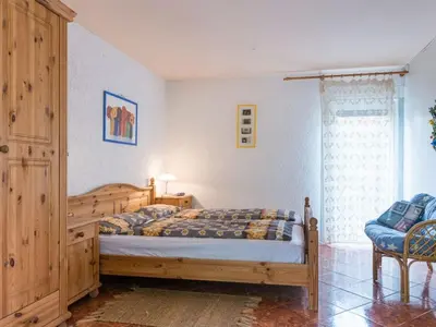 Ein Bett oder Betten in einem Zimmer der Unterkunft Holiday Home Löwenzahn mit Holu by Interhome