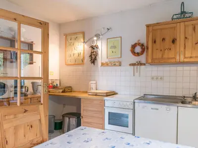 Küche/Küchenzeile in der Unterkunft Holiday Home Löwenzahn mit Holu by Interhome