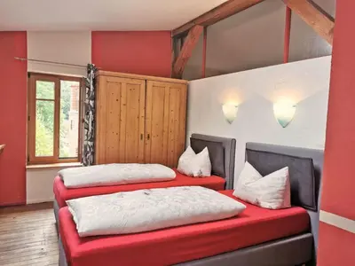 Ein Bett oder Betten in einem Zimmer der Unterkunft Apartment Brennerei Haselberg by Interhome