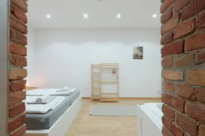 Ein Bett oder Betten in einem Zimmer der Unterkunft DR Apartments Alexanderplatz