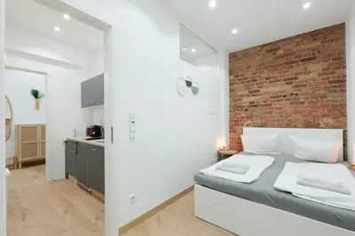 Ein Bett oder Betten in einem Zimmer der Unterkunft DR Apartments Alexanderplatz