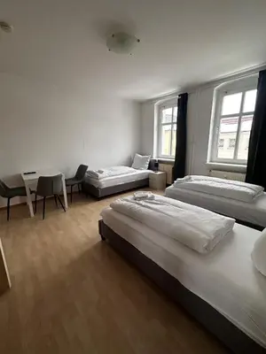 Ein Bett oder Betten in einem Zimmer der Unterkunft 2-Zi-Wohnung und Parkplatz für Geschäftsreisende