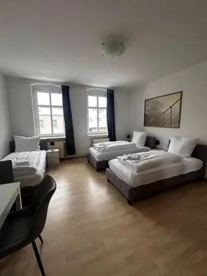 Ein Bett oder Betten in einem Zimmer der Unterkunft 2-Zi-Wohnung und Parkplatz für Geschäftsreisende
